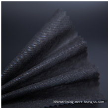 Low temperature fusing polyester paper interlining fabric